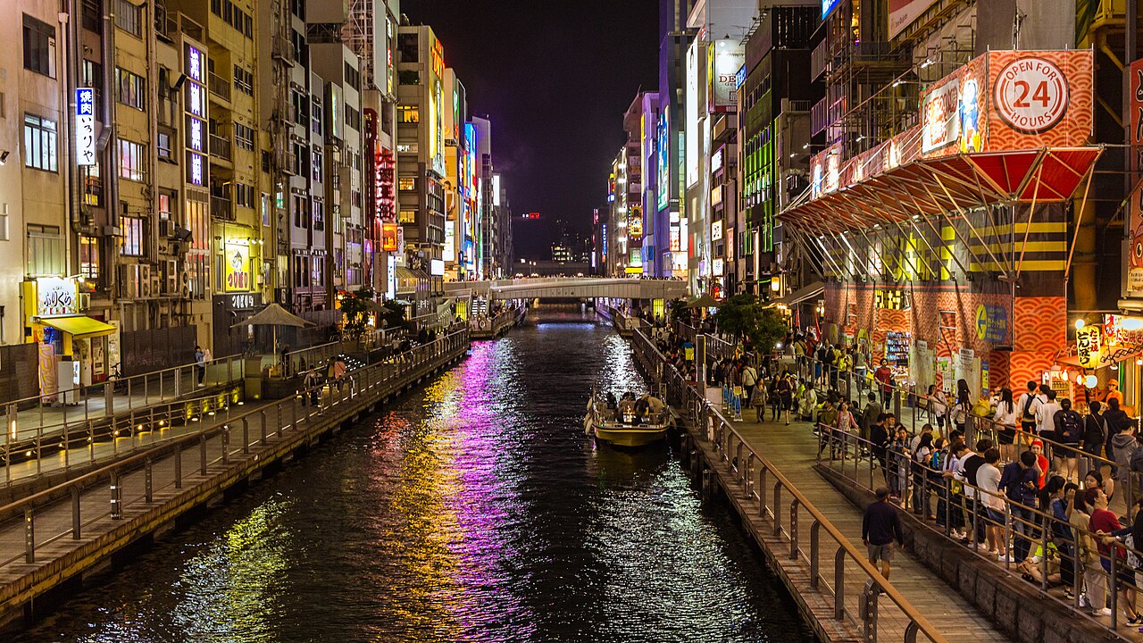Dotonbori canal lined with neon signs